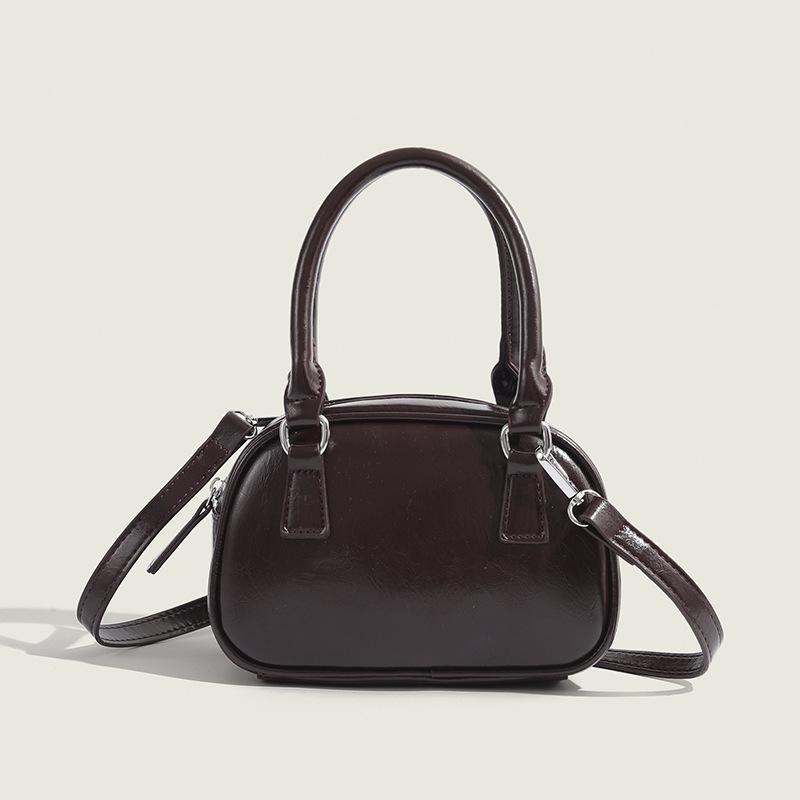 Red Underarm Bag Female Korean Version Niche Design Portable Small Square Bag Light Luxury Messenger Bowling Bag коричневий
Red Underarm Bag Female Korean Version Niche Design Portable Small Square Bag Light Luxury Messenger Bowling Bag коричневий