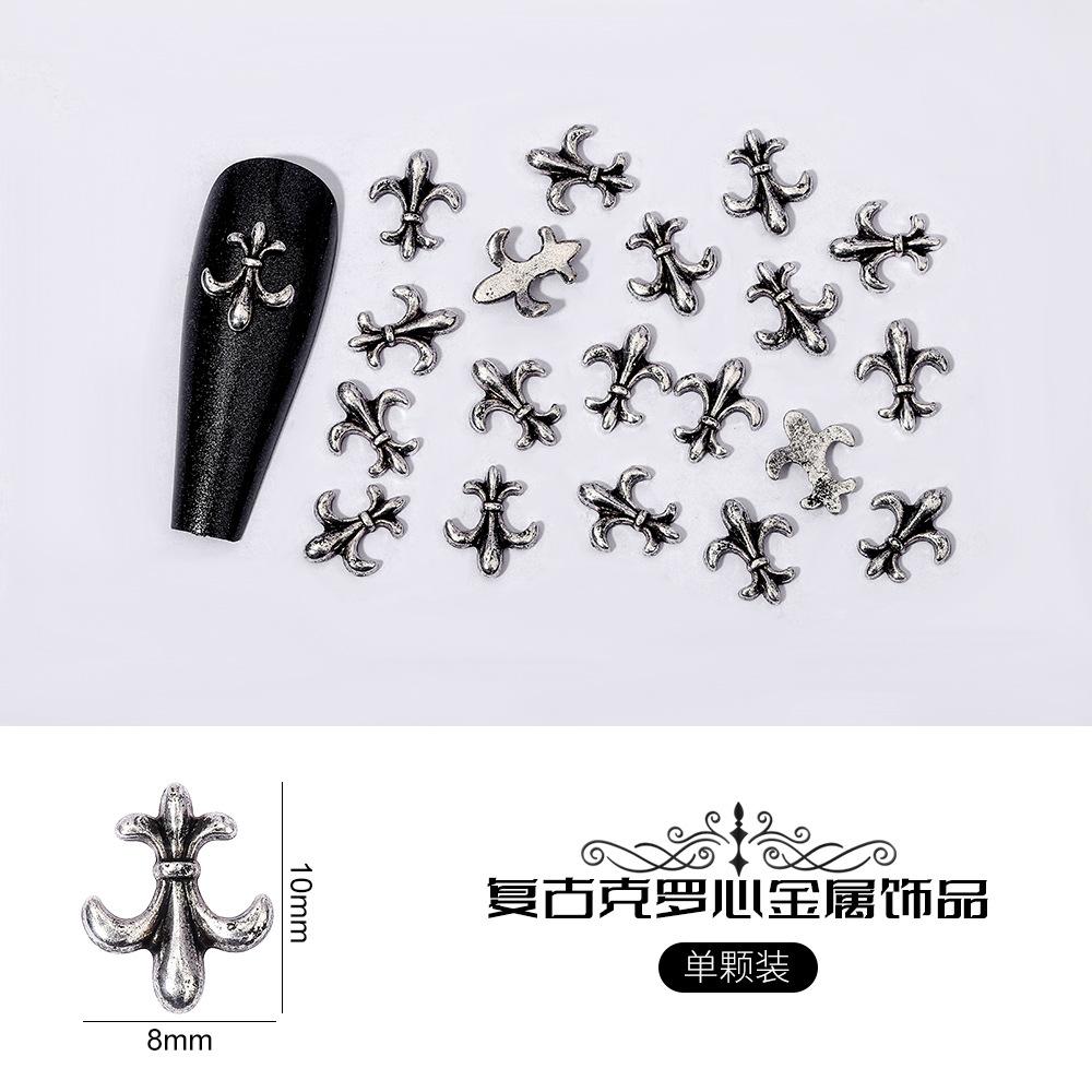 Нейл-арт Ворон Серце Ювелірні вироби Вінтажна біжутерія Панк-стиль Хрест Армія Квітка Шестикутна Зірка Цвях Металеві Аксесуари
Нейл-арт Ворон Серце Ювелірні вироби Вінтажна біжутерія Панк-стиль Хрест Армія Квітка Шестикутна Зірка Цвях Металеві Аксесуари