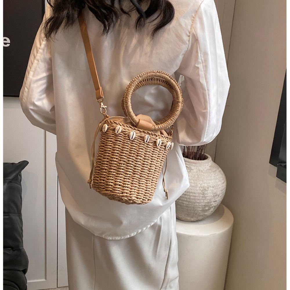 Соломенная соломенная сумка через плечо с кольцевой ручкой Сумка через плечо Легкая плетеная сумка-ведро Seaside Resort
Соломенная соломенная сумка через плечо с кольцевой ручкой Сумка через плечо Легкая плетеная сумка-ведро Seaside Resort