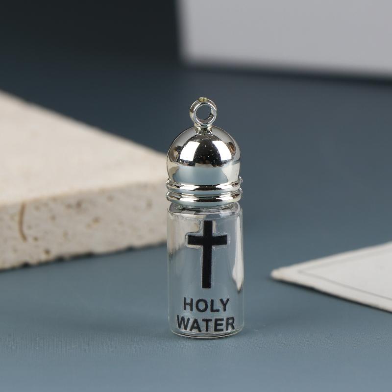 Mini Holy Water Glass Bottle Keychain - Decorative Religious Pendant With Cross Design Perfect For Keys Bags Car Accessories 28x11mm Silver
Mini Holy Water Glass Bottle Keychain - Decorative Religious Pendant With Cross Design Perfect For Keys Bags Car Accessories 28x11mm Silver