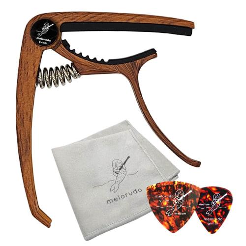 Melorudo Guitar Capo (Dark Woodgrain) with Logo and Two Cross Picks (2 Types, MA100011B01N0)
Melorudo Guitar Capo (Dark Woodgrain) with Logo and Two Cross Picks (2 Types, MA100011B01N0)
