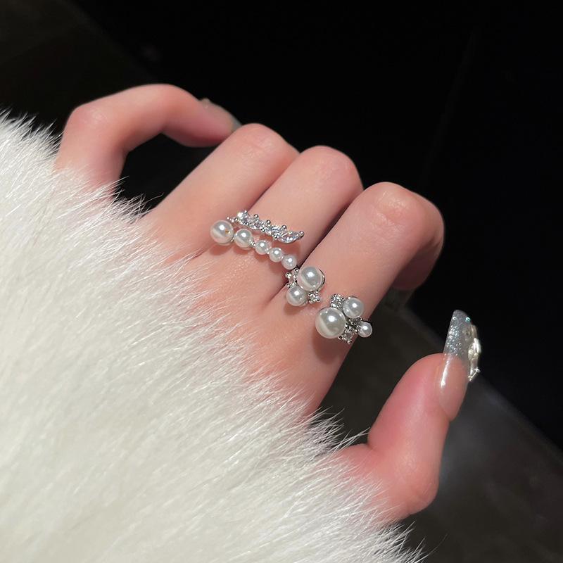 Zirconium wheat ear pearl cross opening ring light luxury high sense index finger ring fashion elegance temperament jewelry women
Zirconium wheat ear pearl cross opening ring light luxury high sense index finger ring fashion elegance temperament jewelry women