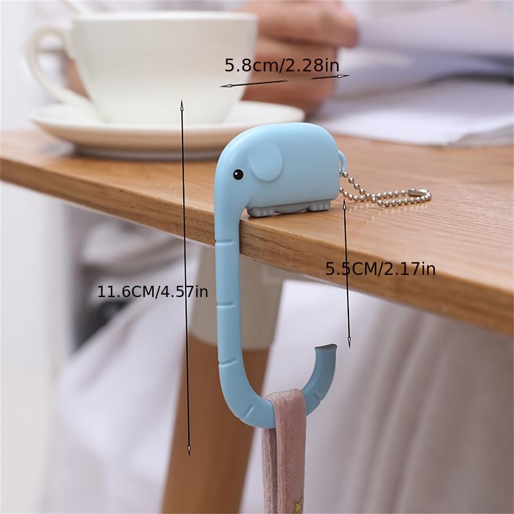 1 cute elephant creative desk side hanging bag hook, portable and detachable office storage hook, multifunctional wardrobe organ синій
1 cute elephant creative desk side hanging bag hook, portable and detachable office storage hook, multifunctional wardrobe organ синій