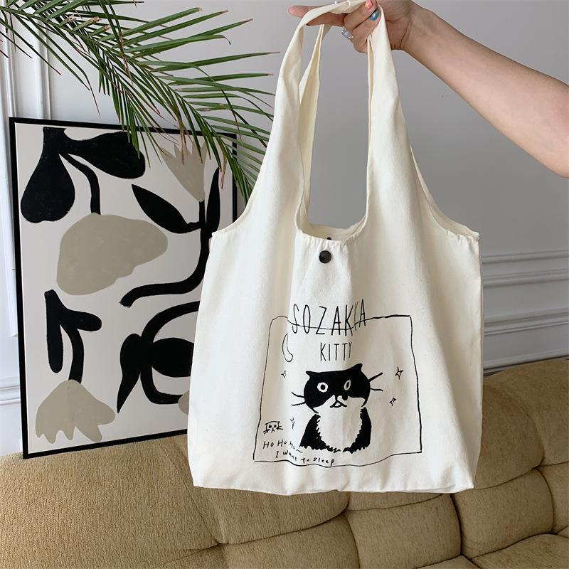 Нова літня сумка з принтом через плече, полотняна сумка для учнівського класу з мультфільмом
Нова літня сумка з принтом через плече, полотняна сумка для учнівського класу з мультфільмом