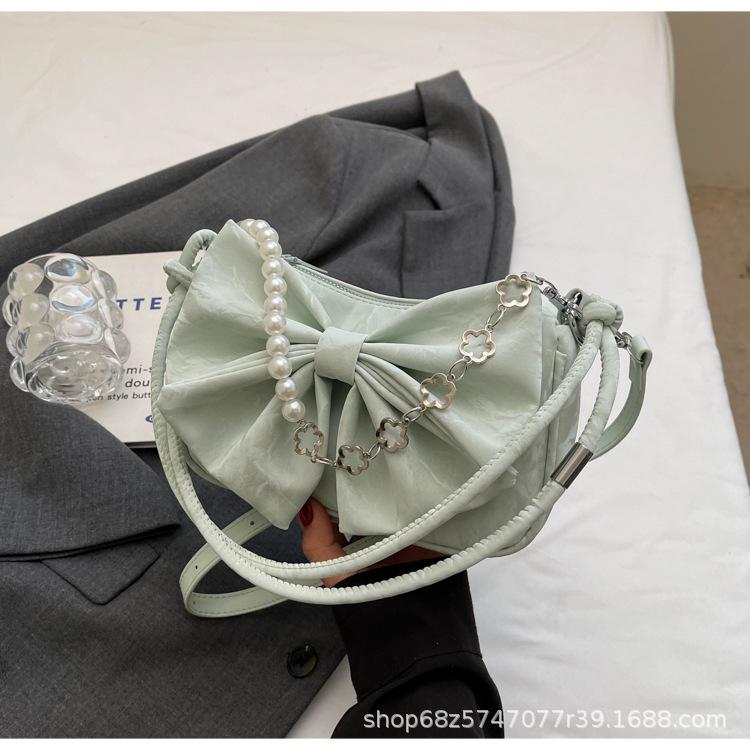 Foreign bow niche casual shoulder bag 2025 new fashion shoulder armpit bag simple casual handbag
Foreign bow niche casual shoulder bag 2025 new fashion shoulder armpit bag simple casual handbag