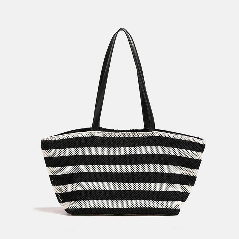 Korean Large-capacity Hollow Knitted Tote Bag Casual Lazy One-shoulder Underarm New Handbag чёрный
Korean Large-capacity Hollow Knitted Tote Bag Casual Lazy One-shoulder Underarm New Handbag чёрный