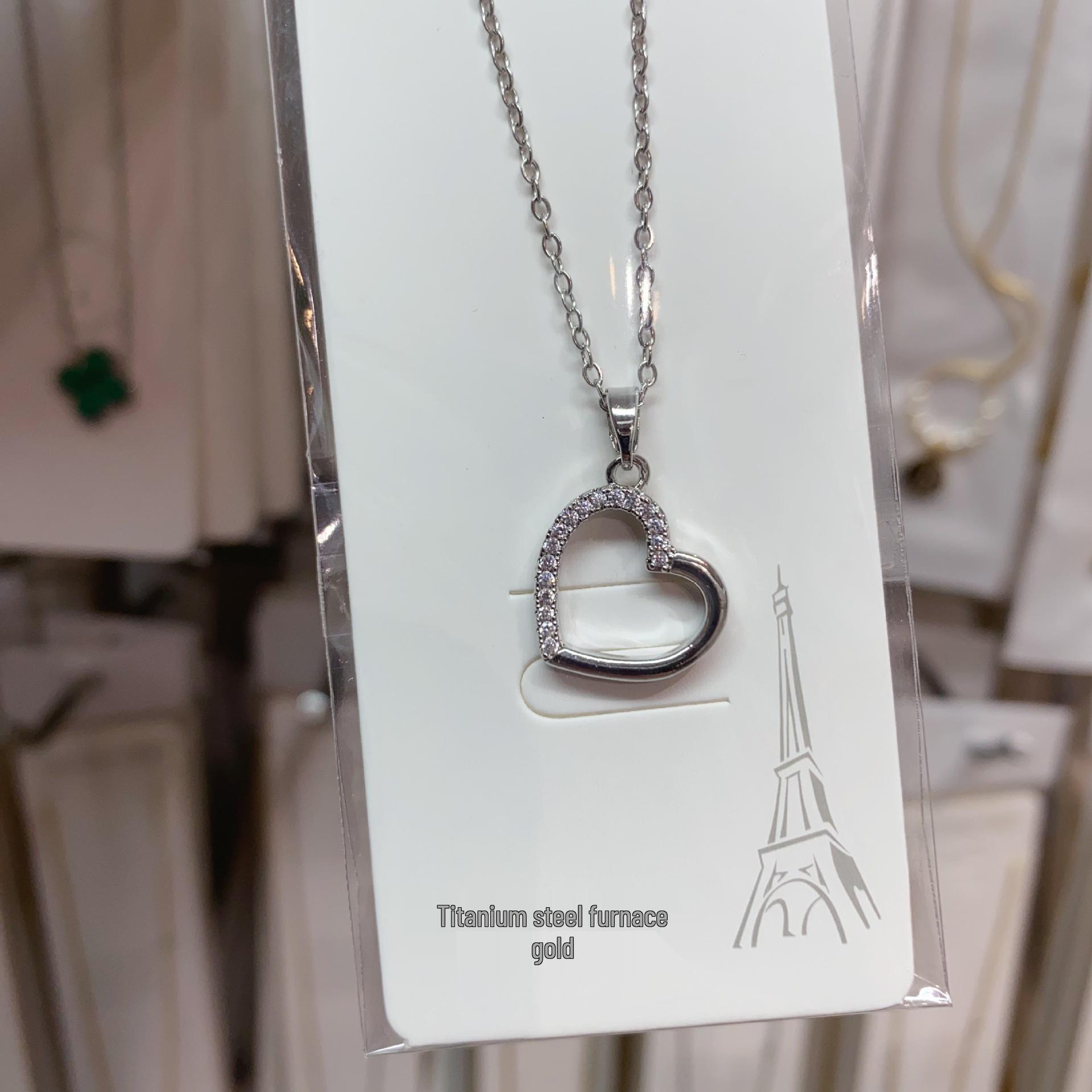 Elegant Hollow Peach Heart Pendant Necklace
Elegant Hollow Peach Heart Pendant Necklace