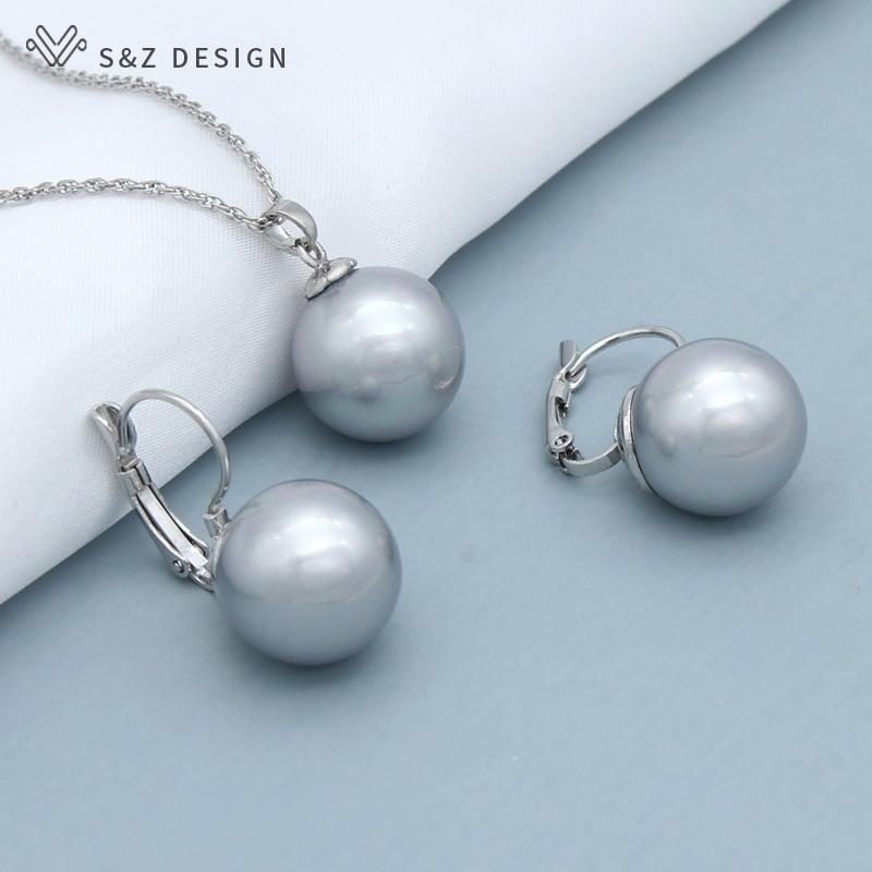 Модні елегантні класичні круглі висячі сережки з імітацією перлів Набори ювелірних виробів для жінок Дівчата Весілля Модне намисто з кулоном з рожевого золота
Модні елегантні класичні круглі висячі сережки з імітацією перлів Набори ювелірних виробів для жінок Дівчата Весілля Модне намисто з кулоном з рожевого золота