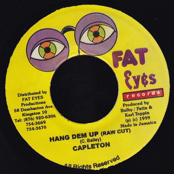 7inch Record CAPLETON - Hang Dem Up NONE Fat Eyes Record 1999 Jamaica Reggae, Ska & Dub Used
7inch Record CAPLETON - Hang Dem Up NONE Fat Eyes Record 1999 Jamaica Reggae, Ska & Dub Used
