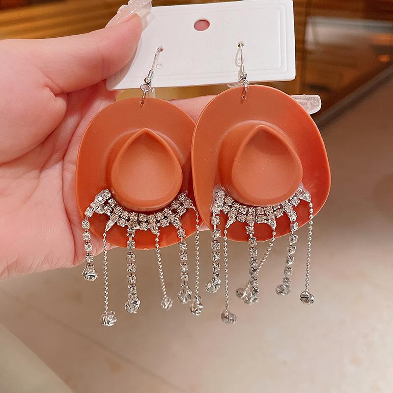 Korean ins cowboy hat with diamonds, fringed ear hook, niche creative earrings, personalized fashion and cold wind earrings.
Korean ins cowboy hat with diamonds, fringed ear hook, niche creative earrings, personalized fashion and cold wind earrings.