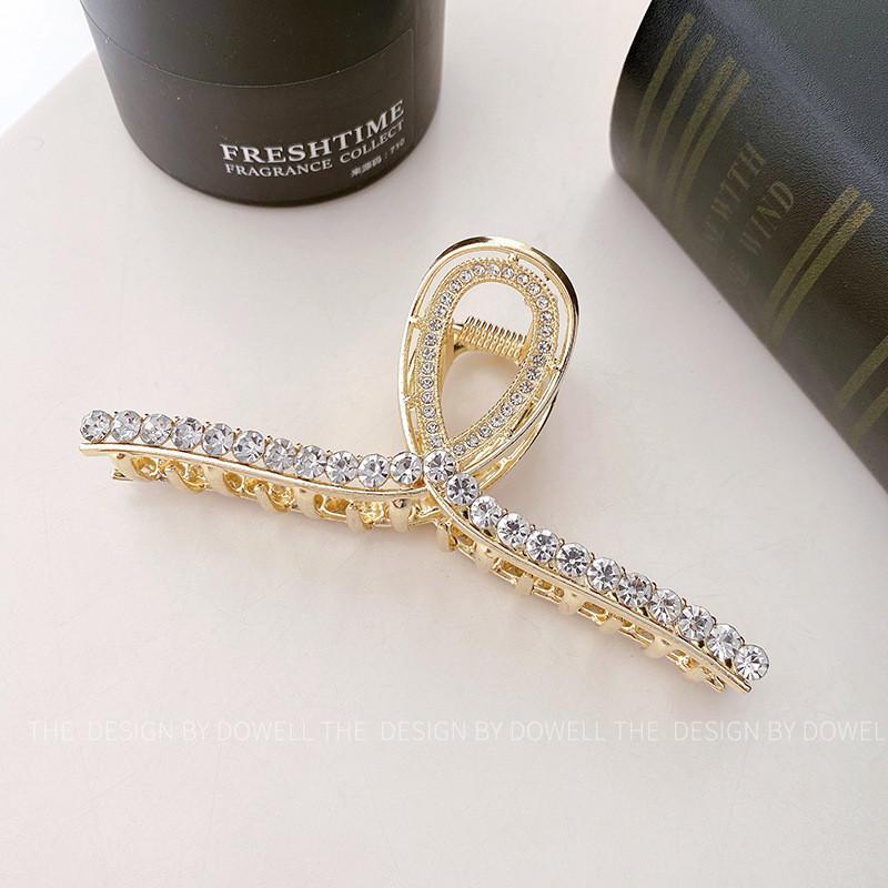 Glamorous Alloy Hair Claw With Cross Design And Pearl Detailing Perfect For Sophisticated Hair Styling RibbonSapphire Clip
Glamorous Alloy Hair Claw With Cross Design And Pearl Detailing Perfect For Sophisticated Hair Styling RibbonSapphire Clip