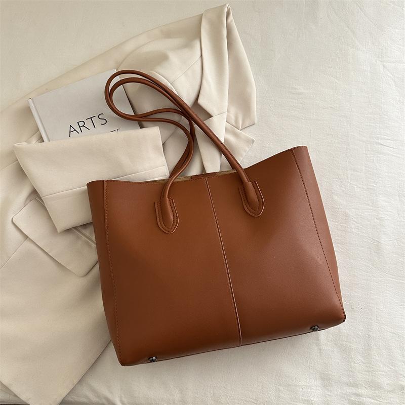 Летняя новая модная универсальная текстурная повседневная простая сумка-тоут большой вместимости для мамы и ребенка, набор из двух предметов, на плечо коричневый
Летняя новая модная универсальная текстурная повседневная простая сумка-тоут большой вместимости для мамы и ребенка, набор из двух предметов, на плечо коричневый