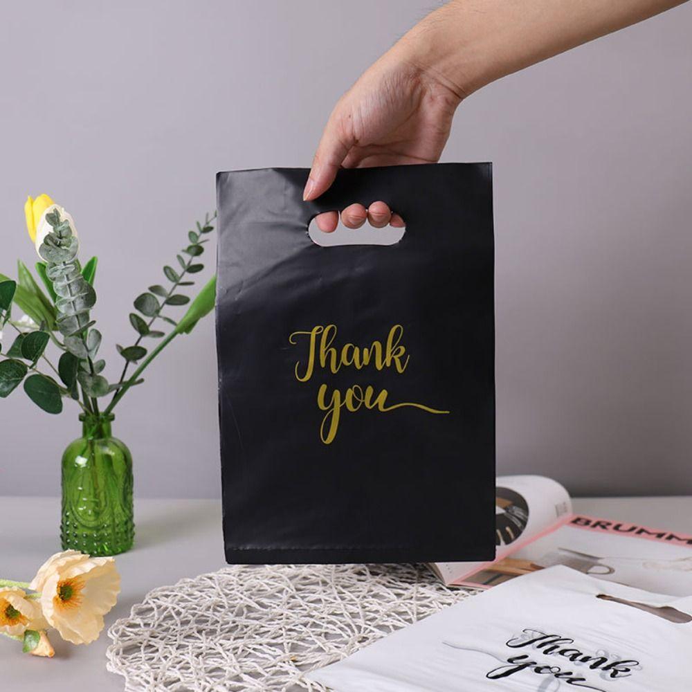 100 Pcs Plastic Thank You Packaging Bag with Handle Tote Bag Carry Out Bags Shopping Bag Birthday 15x20CM
100 Pcs Plastic Thank You Packaging Bag with Handle Tote Bag Carry Out Bags Shopping Bag Birthday 15x20CM