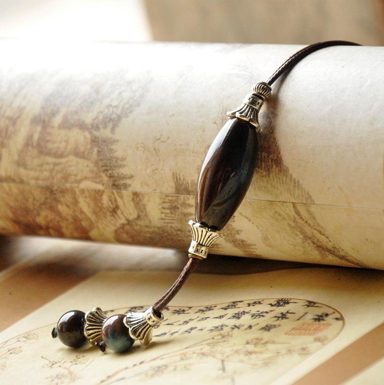 Керамическое ожерелье-свитер в этническом стиле: Женское тканое изделие в древнем стиле
Керамическое ожерелье-свитер в этническом стиле: Женское тканое изделие в древнем стиле