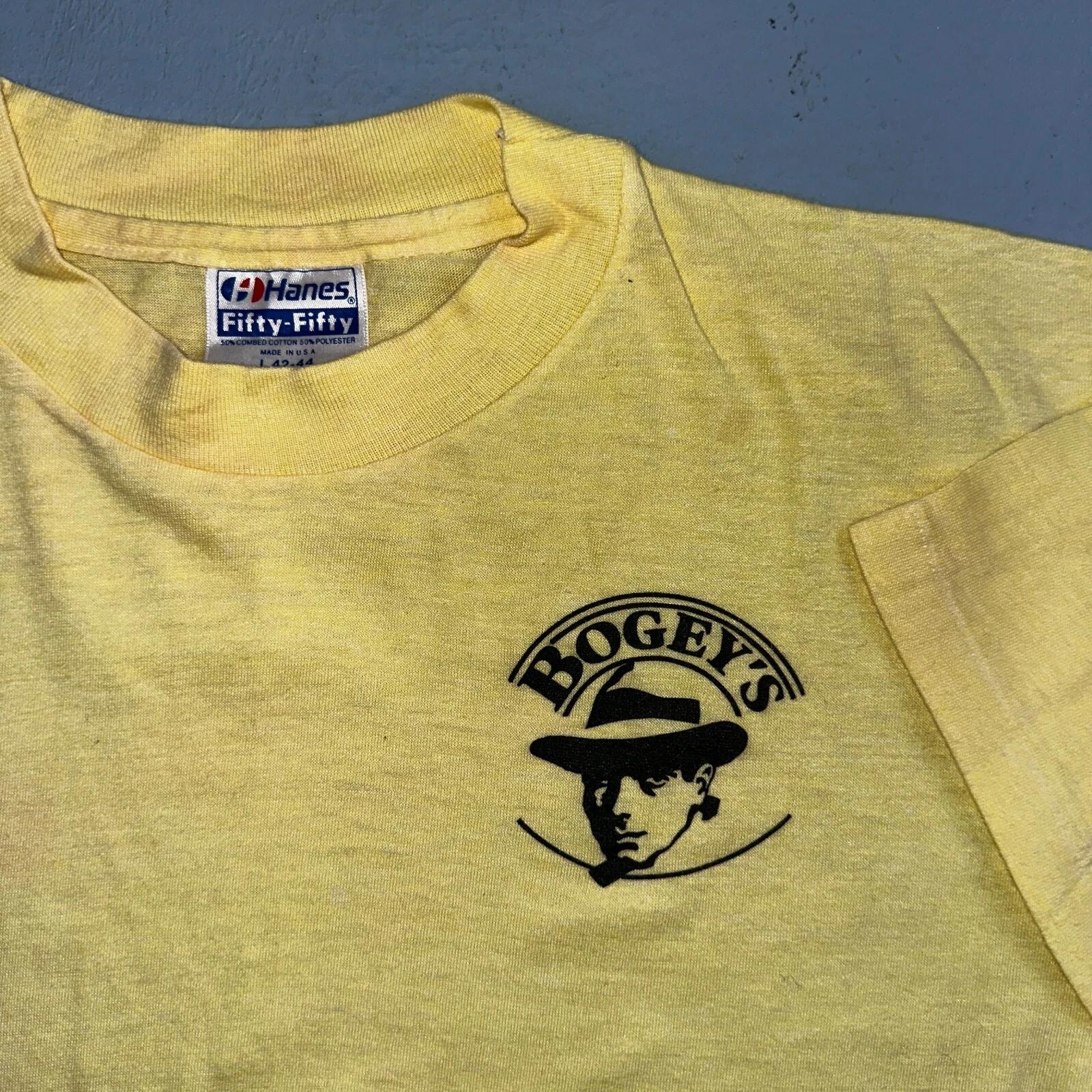 Hanes Bogeys VTG T Shirt Single Stitch Yellow Art Promo Large Classic Fun 50 L
Hanes Bogeys VTG T Shirt Single Stitch Yellow Art Promo Large Classic Fun 50 L