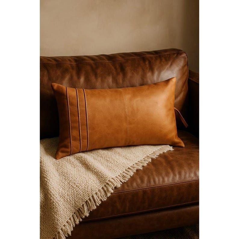 Melbourne Leather Co Rustic Tan Leather Lumbar Cushion | Handmade Boho Accent Pillow Cover Gift For Her Him Birthday Anniversary 11 x 19 in
Melbourne Leather Co Rustic Tan Leather Lumbar Cushion | Handmade Boho Accent Pillow Cover Gift For Her Him Birthday Anniversary 11 x 19 in
