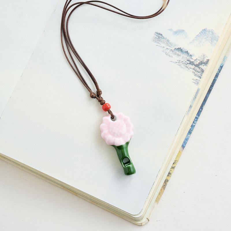 Sunflower Ceramic Cartoon Whistle Necklace - Playful Gift for Girls
Sunflower Ceramic Cartoon Whistle Necklace - Playful Gift for Girls