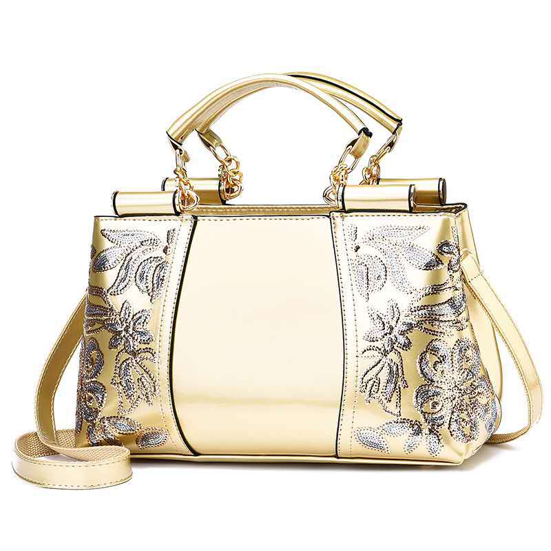 Luxurious Women s Leather Bag with Shiny Flower Trim золотий
Luxurious Women s Leather Bag with Shiny Flower Trim золотий