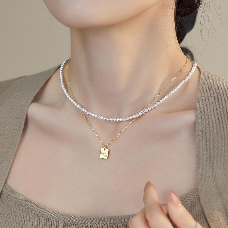 Shi Jia Pearl Goodluck Pendant Layered Necklace: Chic Chinese Clavicle Chain for Women, Celebrity-Style Choker
Shi Jia Pearl Goodluck Pendant Layered Necklace: Chic Chinese Clavicle Chain for Women, Celebrity-Style Choker