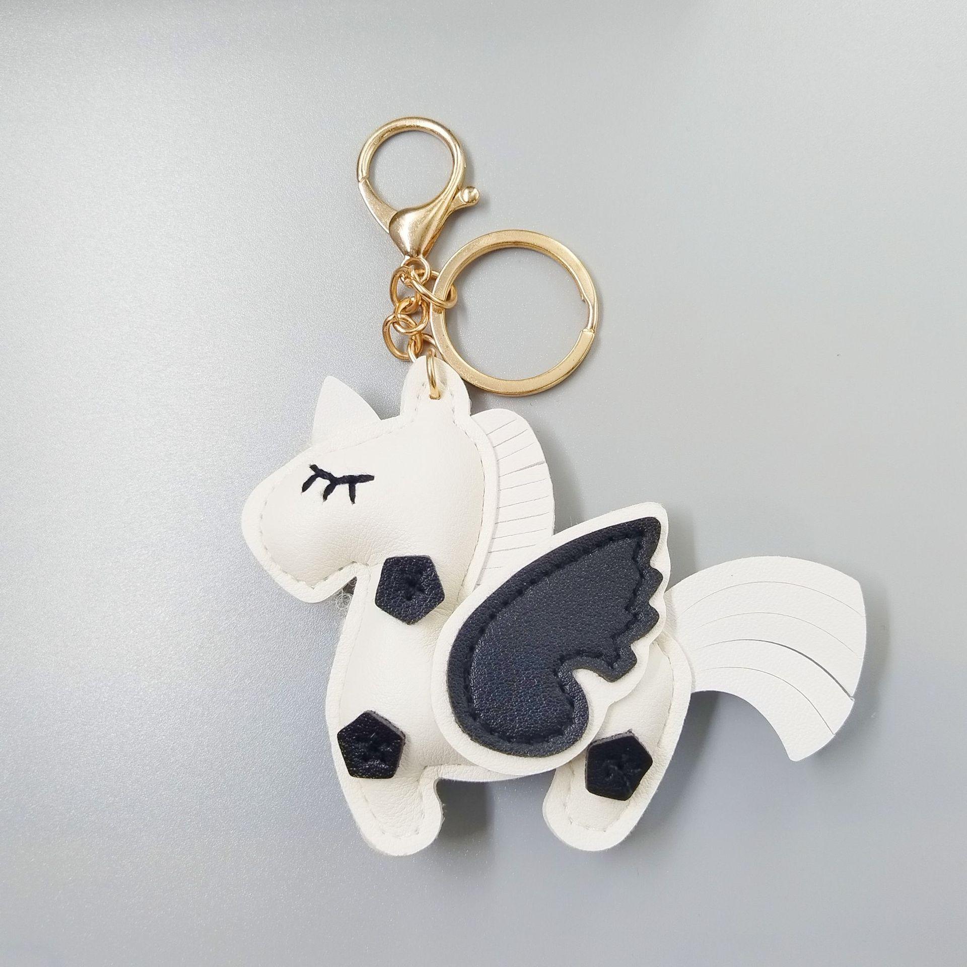 Creative Double-Sided Leather Unicorn Bag Charm: Color Contrast 3D Handmade Pegasus Keychain Pendant білий
Creative Double-Sided Leather Unicorn Bag Charm: Color Contrast 3D Handmade Pegasus Keychain Pendant білий