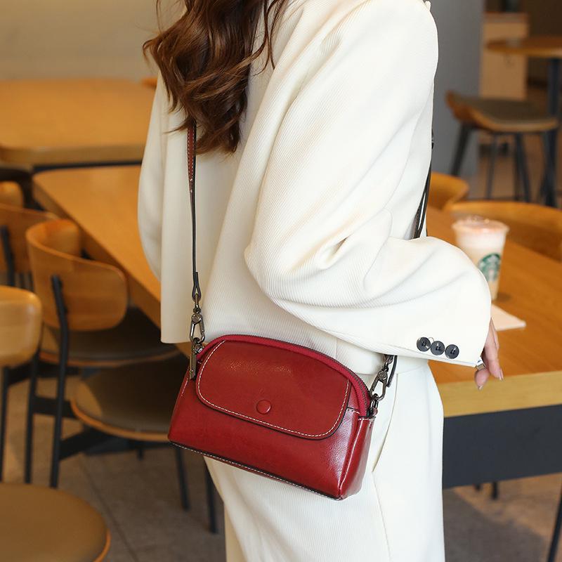 2025 Stylish Genuine Leather Women s Crossbody Phone Bag - Small Fragrance Mini Design
2025 Stylish Genuine Leather Women s Crossbody Phone Bag - Small Fragrance Mini Design