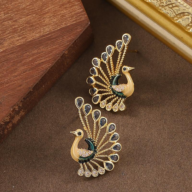 French elegance temperament court style full of diamonds peacock open screen stud earrings niche personality design sense Xiaoxiang earrings синий
French elegance temperament court style full of diamonds peacock open screen stud earrings niche personality design sense Xiaoxiang earrings синий