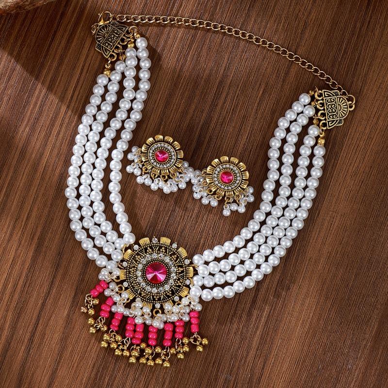 Meier Multi-layer pearl rice bead tassel earring necklace set - bohemian ethnic jewelry
Meier Multi-layer pearl rice bead tassel earring necklace set - bohemian ethnic jewelry