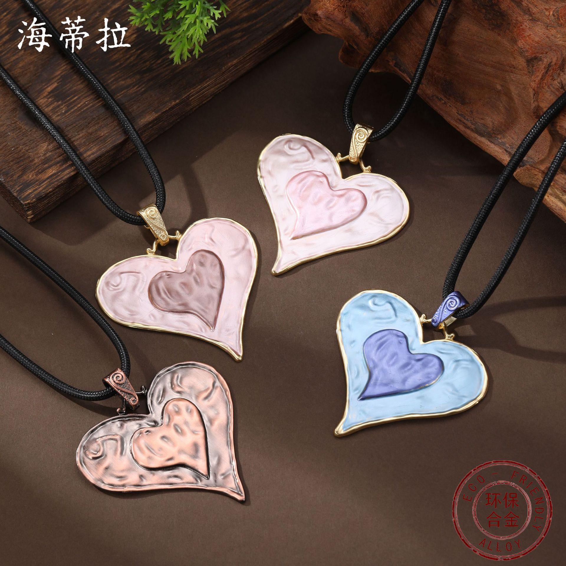 New enamel color love leather rope long pendant women exaggerated color heart-shaped versatile long necklace
New enamel color love leather rope long pendant women exaggerated color heart-shaped versatile long necklace