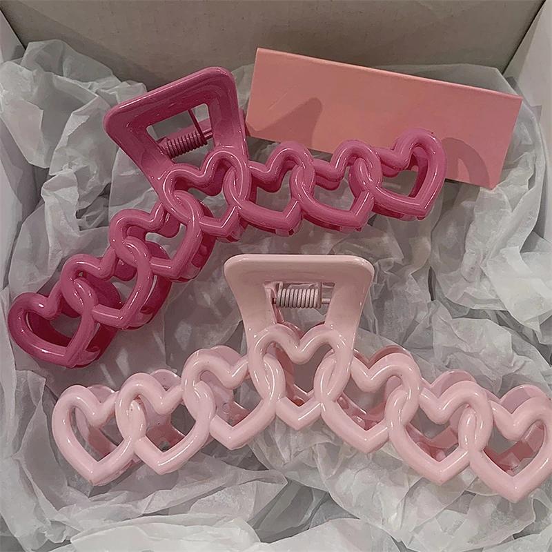 New Y2k Dopamine Girl Fashion Pink Color Hollow Geometric Star Heart Hair Clips Women Hair Claw Cross Headband Shark Clip
New Y2k Dopamine Girl Fashion Pink Color Hollow Geometric Star Heart Hair Clips Women Hair Claw Cross Headband Shark Clip
