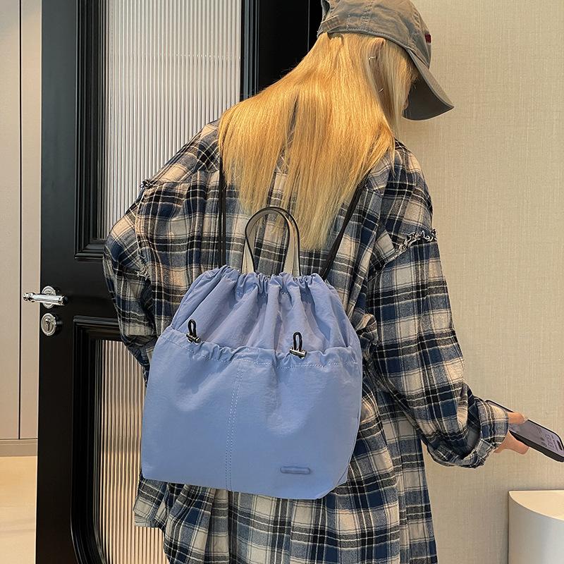 Large capacity backpack women s fashion niche drawstring schoolbag bucket bag leisure lightweight travel backpack
Large capacity backpack women s fashion niche drawstring schoolbag bucket bag leisure lightweight travel backpack
