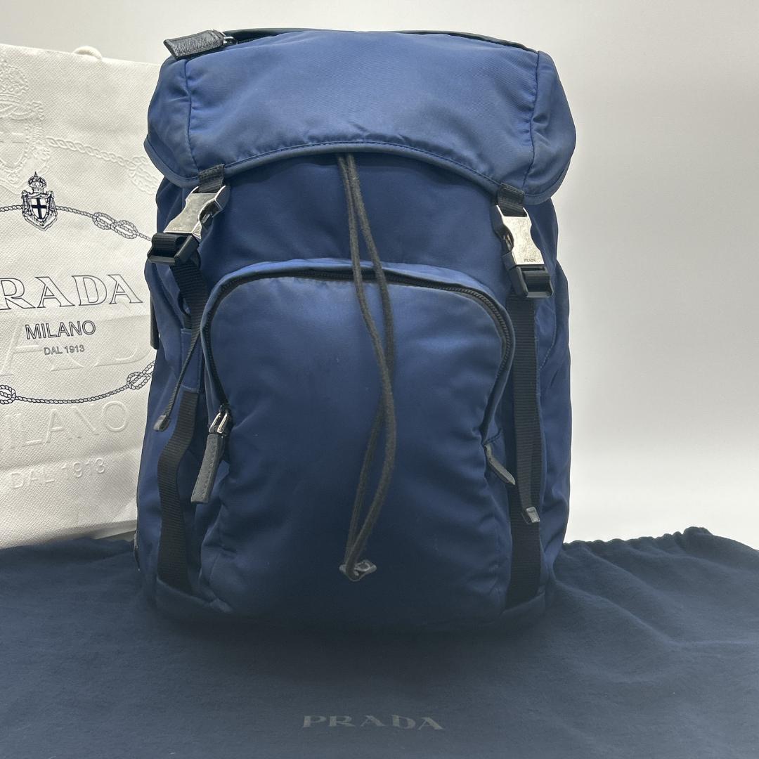 PRADA 2VZ135 Tessuto Nylon Backpack Travel Bag with Triangle Logo Plate Navy Black White Tag Includes Storage Pouch
PRADA 2VZ135 Tessuto Nylon Backpack Travel Bag with Triangle Logo Plate Navy Black White Tag Includes Storage Pouch