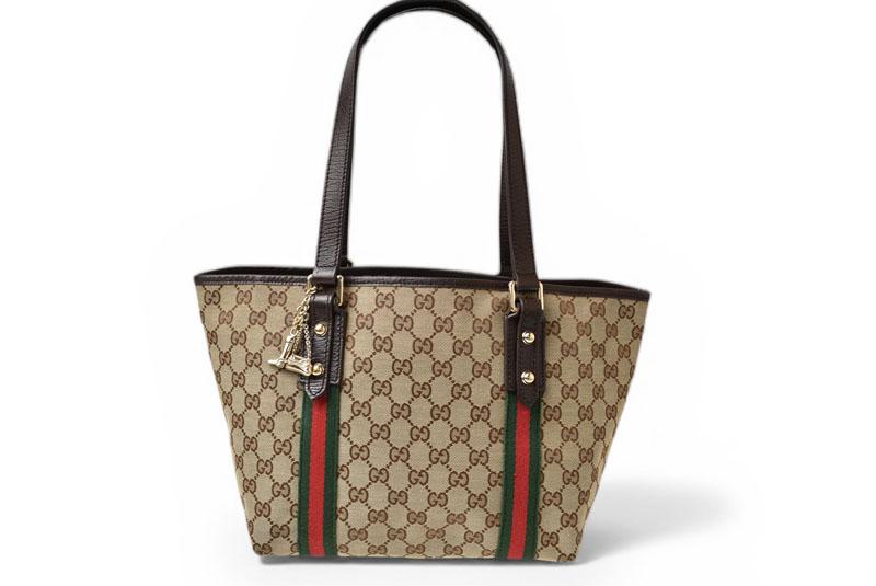 Вживана сумка-тоут GUCCI з полотна GG унісекс
Вживана сумка-тоут GUCCI з полотна GG унісекс