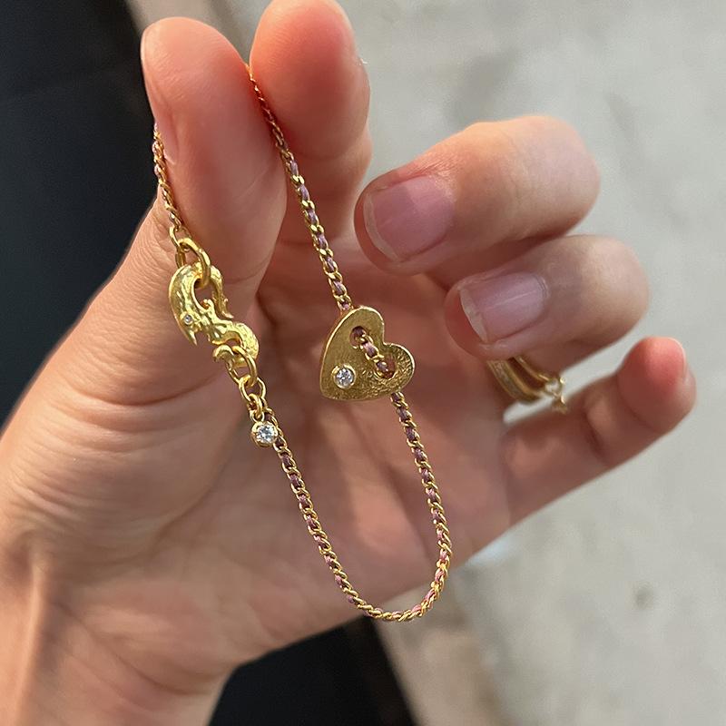 New trendy hip-hop style heart-shaped braided rope bracelets fashion light luxury antique gold craftsm bracelet banquet jewelry золотий
New trendy hip-hop style heart-shaped braided rope bracelets fashion light luxury antique gold craftsm bracelet banquet jewelry золотий