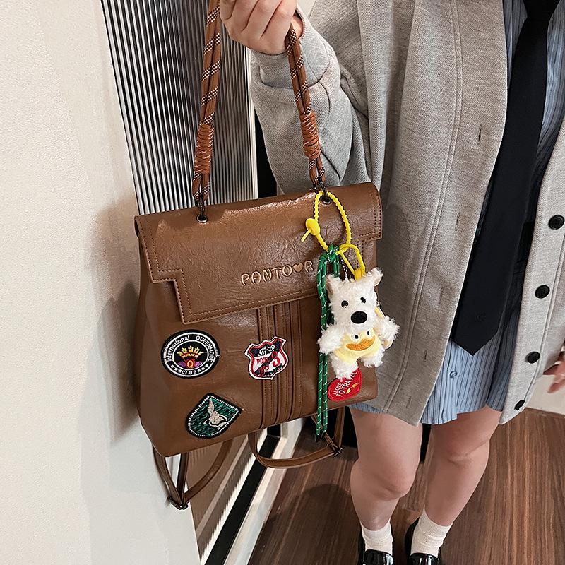 Korean Retro Badge Backpack for Women - 2024 Fashion, Multifunctional, Large Capacity, Portable Shoulder Bag
Korean Retro Badge Backpack for Women - 2024 Fashion, Multifunctional, Large Capacity, Portable Shoulder Bag