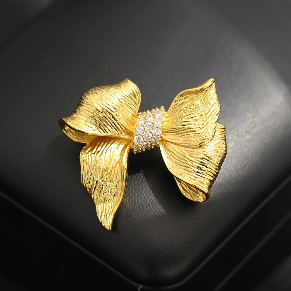 New high-end niche gold satin gold texture bow brooch exquisite high-end coat pin accessories золотий
New high-end niche gold satin gold texture bow brooch exquisite high-end coat pin accessories золотий