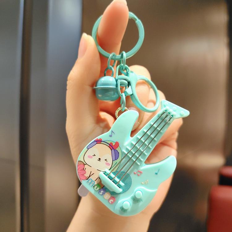 Mini Handheld Guitar Game Keychain Claw Machine Pendant for Kids
Mini Handheld Guitar Game Keychain Claw Machine Pendant for Kids