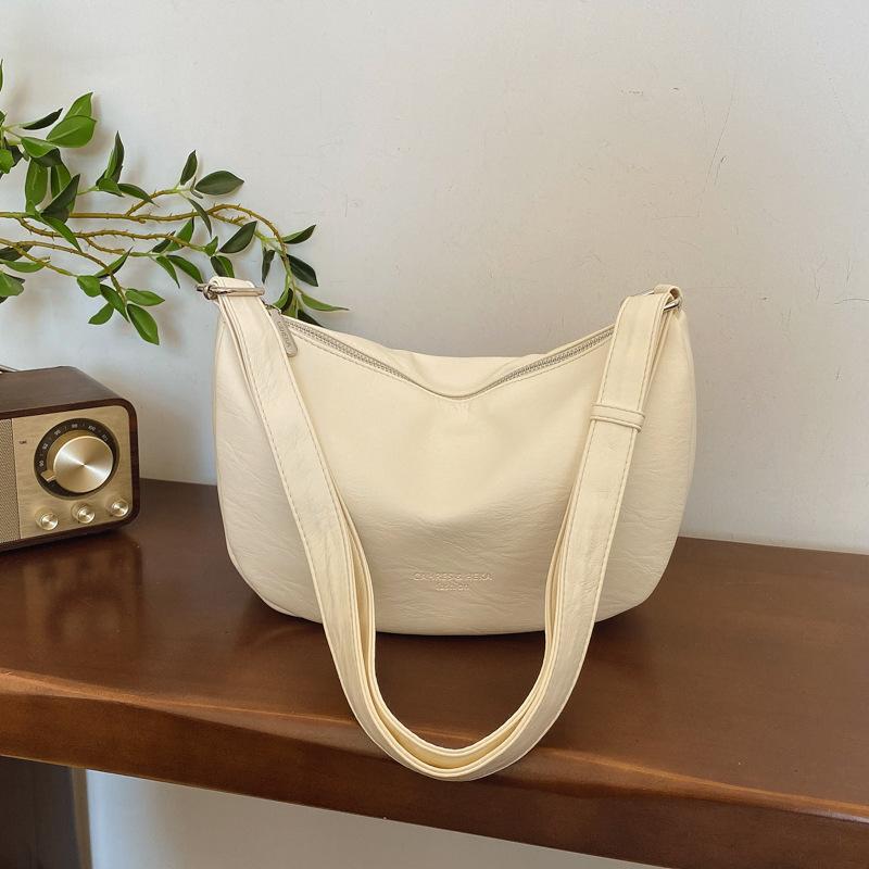 Retro bag women s large-capacity new niche design high-end texture messenger bag commuter dumpling bag покинуть белый
Retro bag women s large-capacity new niche design high-end texture messenger bag commuter dumpling bag покинуть белый