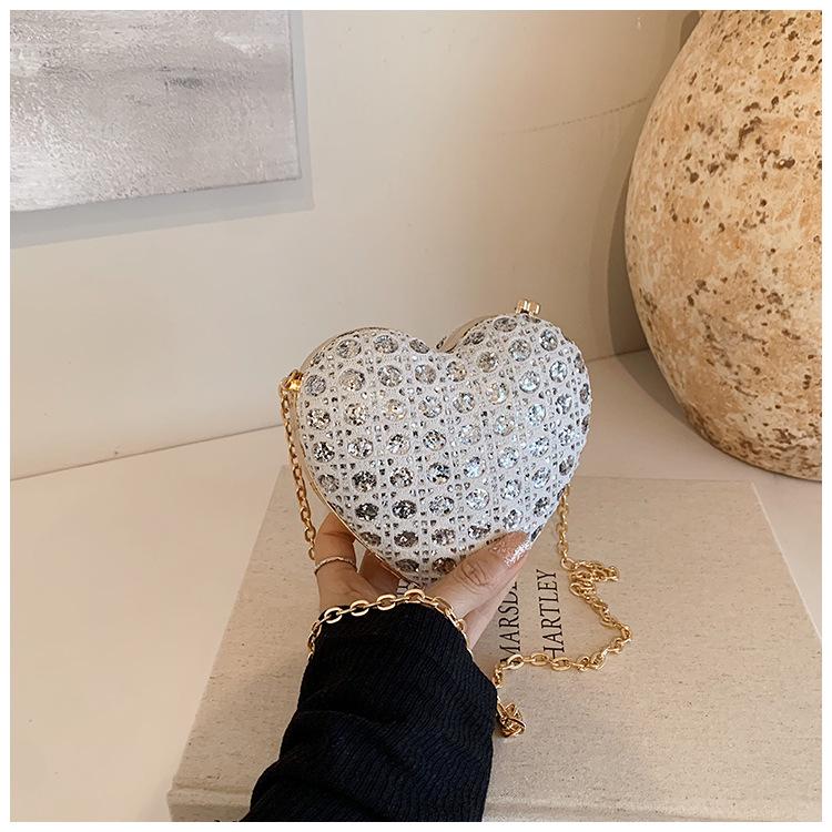 2024 Летняя Мини Сумка-Замок в Корейском Стиле и Кошелек для Монет в Форме Сердца - Модная Женская Сумка через Плечо Кроссбоди серебряный
2024 Летняя Мини Сумка-Замок в Корейском Стиле и Кошелек для Монет в Форме Сердца - Модная Женская Сумка через Плечо Кроссбоди серебряный