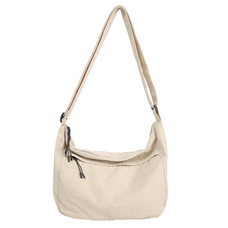 Large capacity nylon messenger bag shoulder tote bag бежевий
Large capacity nylon messenger bag shoulder tote bag бежевий