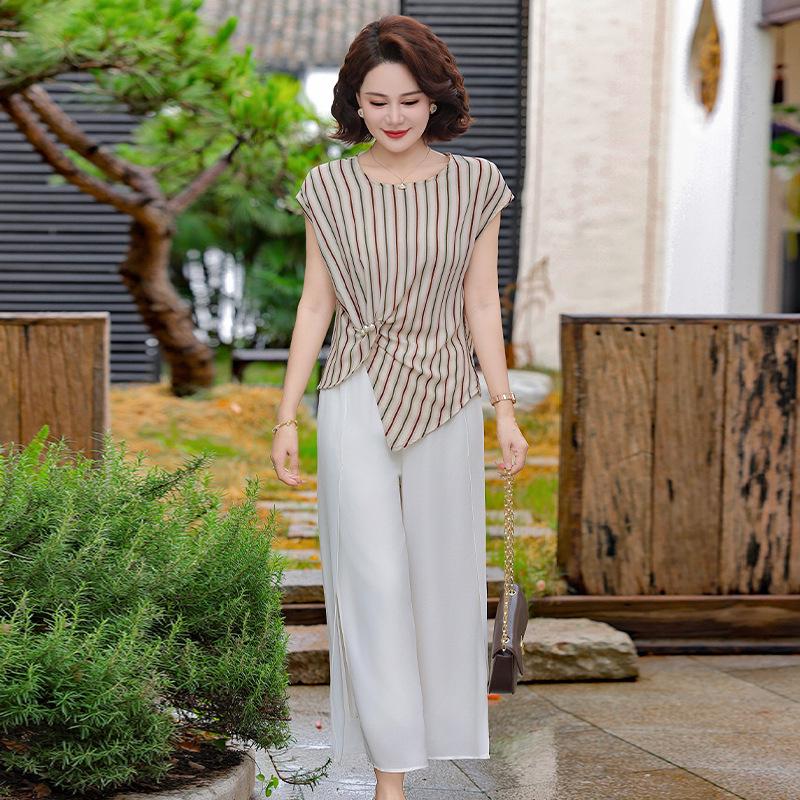 Young Mother s 2026 Summer Two-Piece - Short Sleeve Blouse & T-Shirt Set for Fashionable Middle-Aged Women. 5XL (For 73-80 kg)
Young Mother s 2026 Summer Two-Piece - Short Sleeve Blouse & T-Shirt Set for Fashionable Middle-Aged Women. 5XL (For 73-80 kg)
