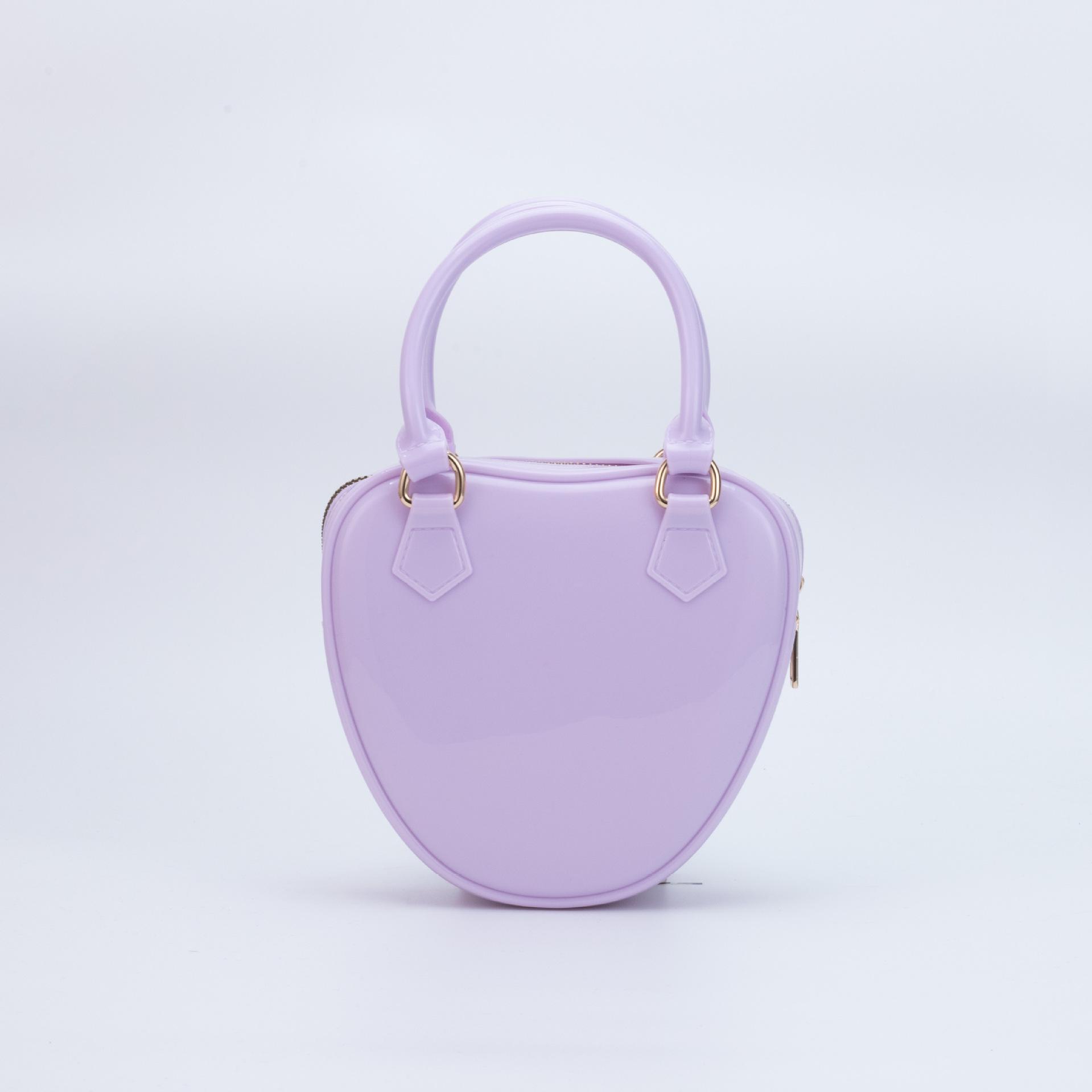 Новые женские сумки через плечо, модные однотонные вечерние сумки в форме сердца, универсальные женские сумки-желе для поездок на работу, трендовые сумки через плечо
Новые женские сумки через плечо, модные однотонные вечерние сумки в форме сердца, универсальные женские сумки-желе для поездок на работу, трендовые сумки через плечо