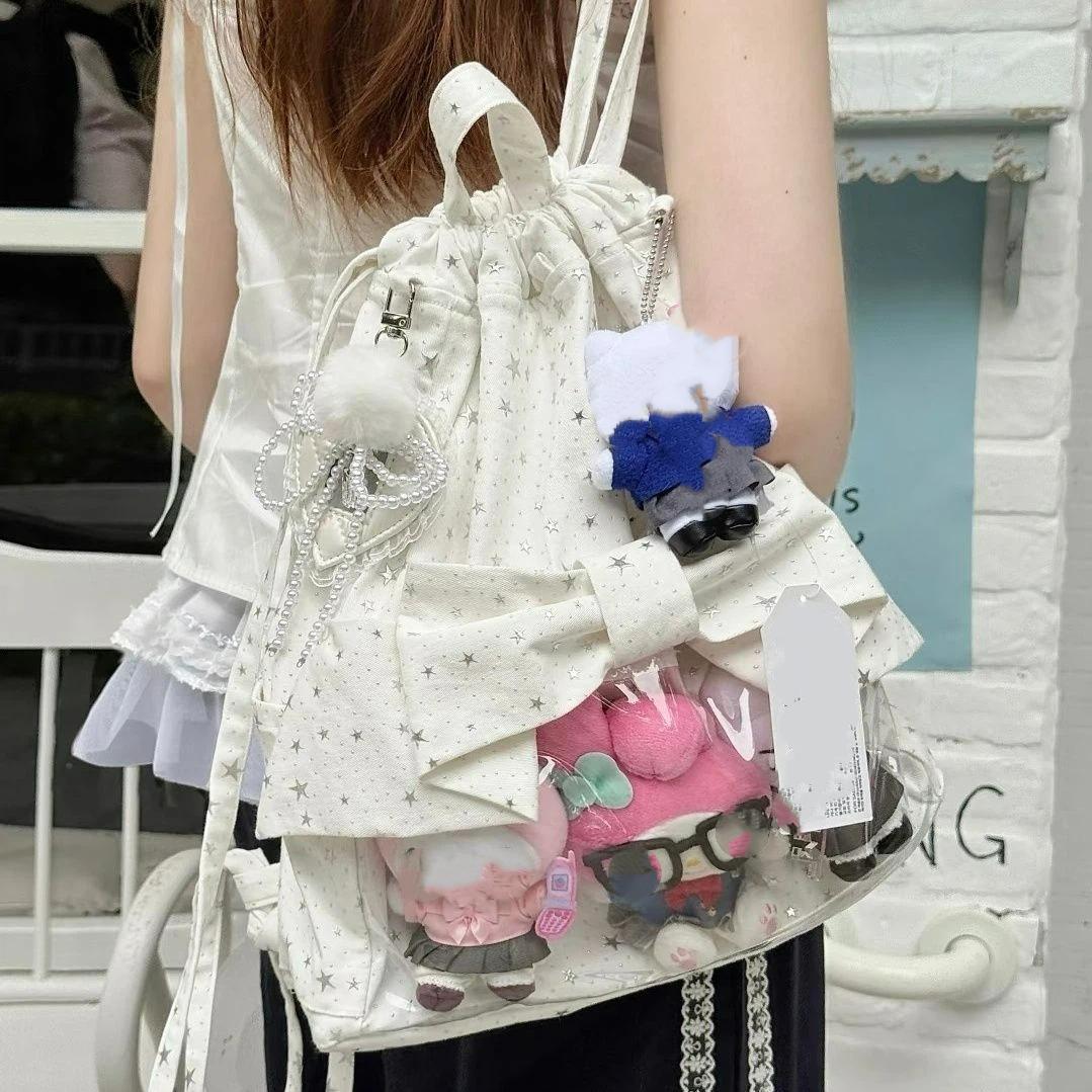 New Y2K Ballet Bow Drawstring Ita Backpack Cute Girl Transparent Knapsack Large Capacity DIY Doll Display Star Dots Shoulder Bag 35X30X10cm
New Y2K Ballet Bow Drawstring Ita Backpack Cute Girl Transparent Knapsack Large Capacity DIY Doll Display Star Dots Shoulder Bag 35X30X10cm