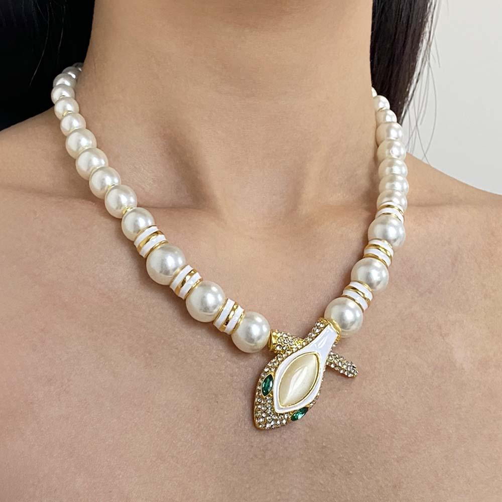 French Vintage Diamond Snake Head Pearl Necklace – Women’s Enamel Drip Oil Choker золотой
French Vintage Diamond Snake Head Pearl Necklace – Women’s Enamel Drip Oil Choker золотой