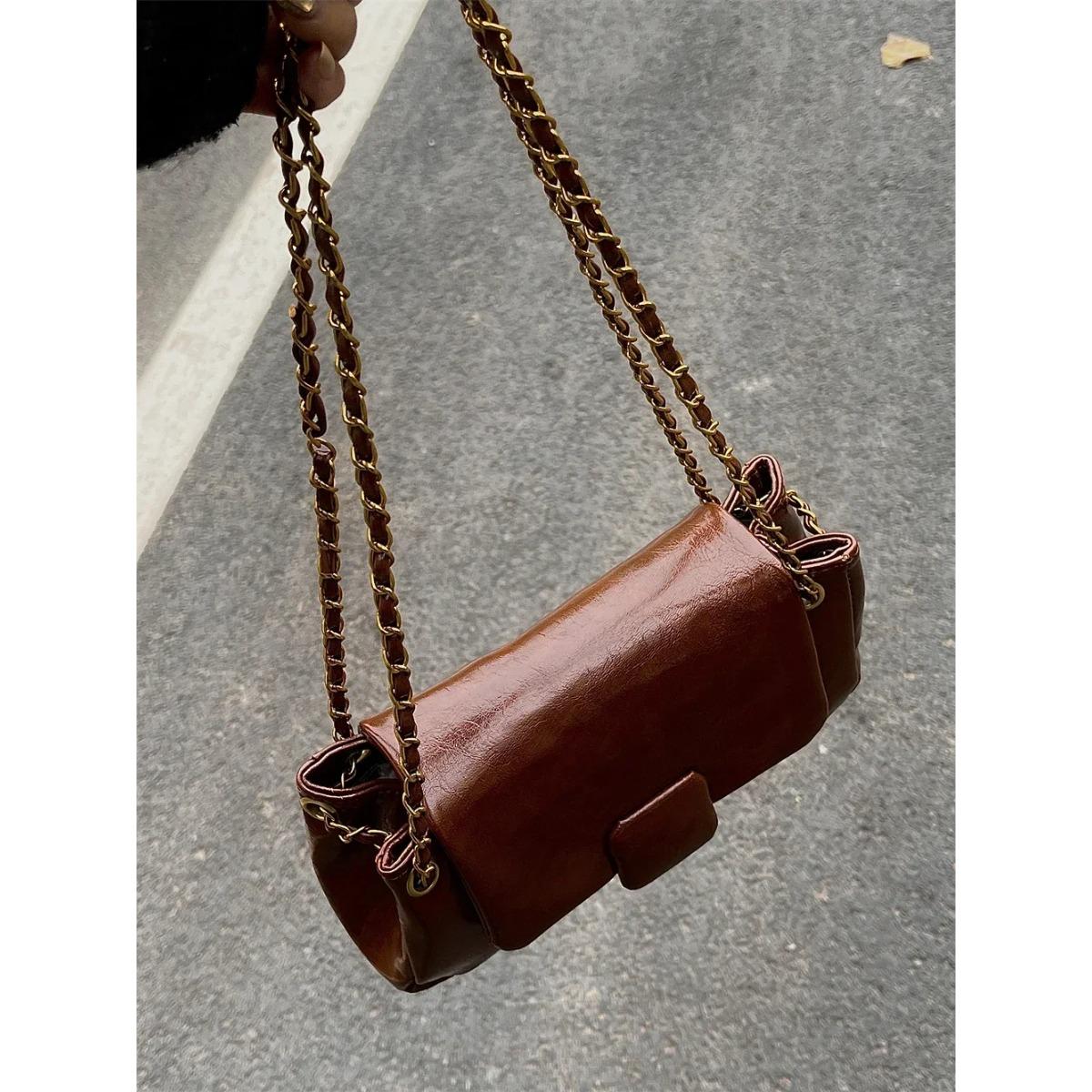 Ретро женские сумки через плечо подмышки новая текстура плутониевая кожа цепи сумка-мессенджер
Ретро женские сумки через плечо подмышки новая текстура плутониевая кожа цепи сумка-мессенджер