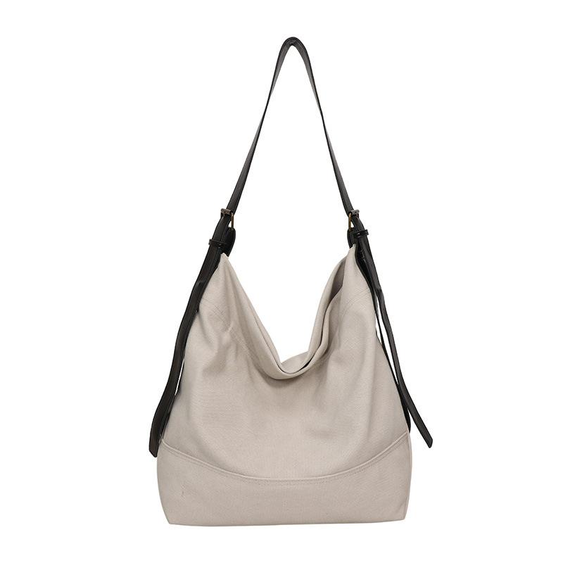 Slack simple solid color canvas tote bag high value retro large capacity canvas shoulder crossbody bucket bag
Slack simple solid color canvas tote bag high value retro large capacity canvas shoulder crossbody bucket bag