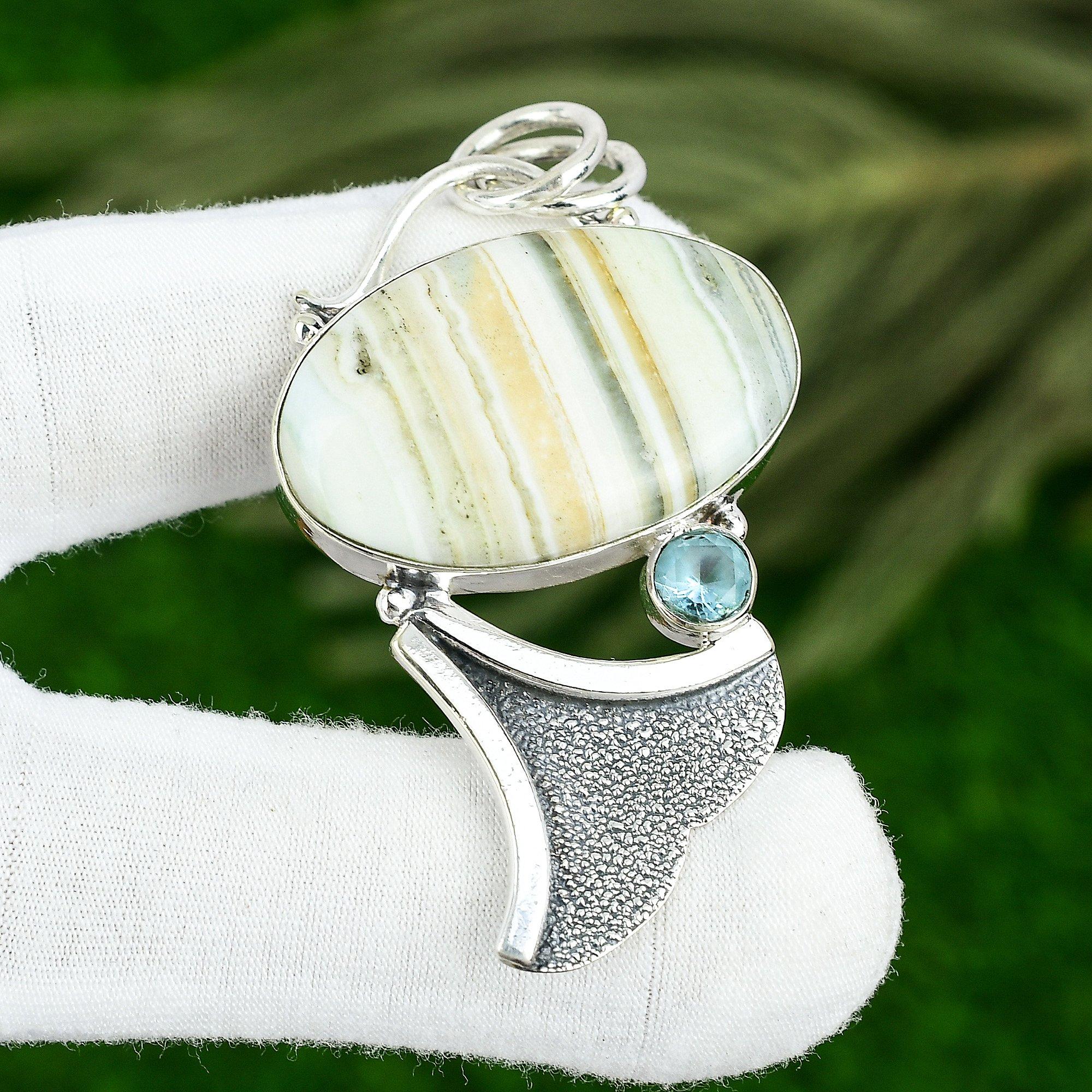 925 Silver Oval Blue Rhodochrosite Stone Apatite Birthday Ethnic Pendant Jewelry
925 Silver Oval Blue Rhodochrosite Stone Apatite Birthday Ethnic Pendant Jewelry