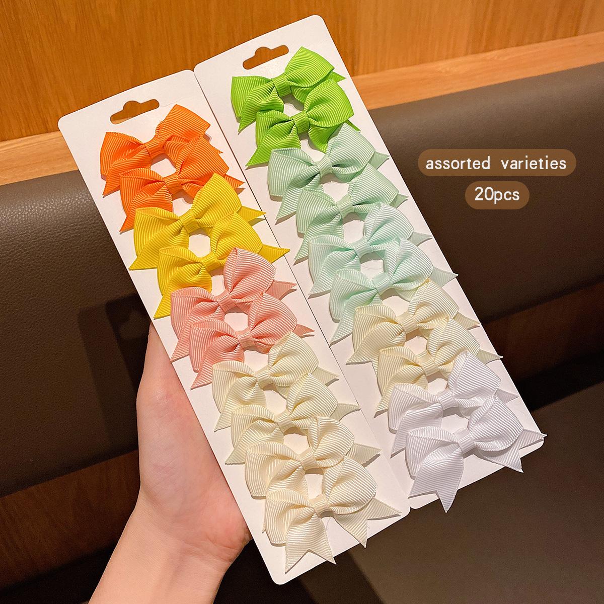 20 colorful bow hair clips with random sweet and stylish colors, suitable for daily use as hair accessories
20 colorful bow hair clips with random sweet and stylish colors, suitable for daily use as hair accessories