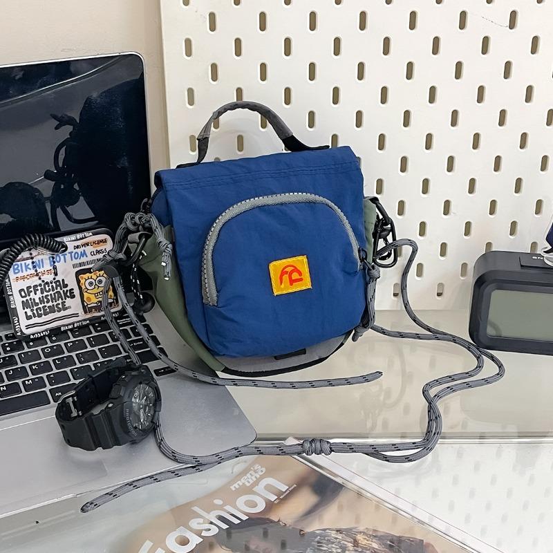 Korean niche design contrasting color nylon shoulder light fashion versatile handbag personalized trend foreign style messenger bag 17*6*17 синій
Korean niche design contrasting color nylon shoulder light fashion versatile handbag personalized trend foreign style messenger bag 17*6*17 синій