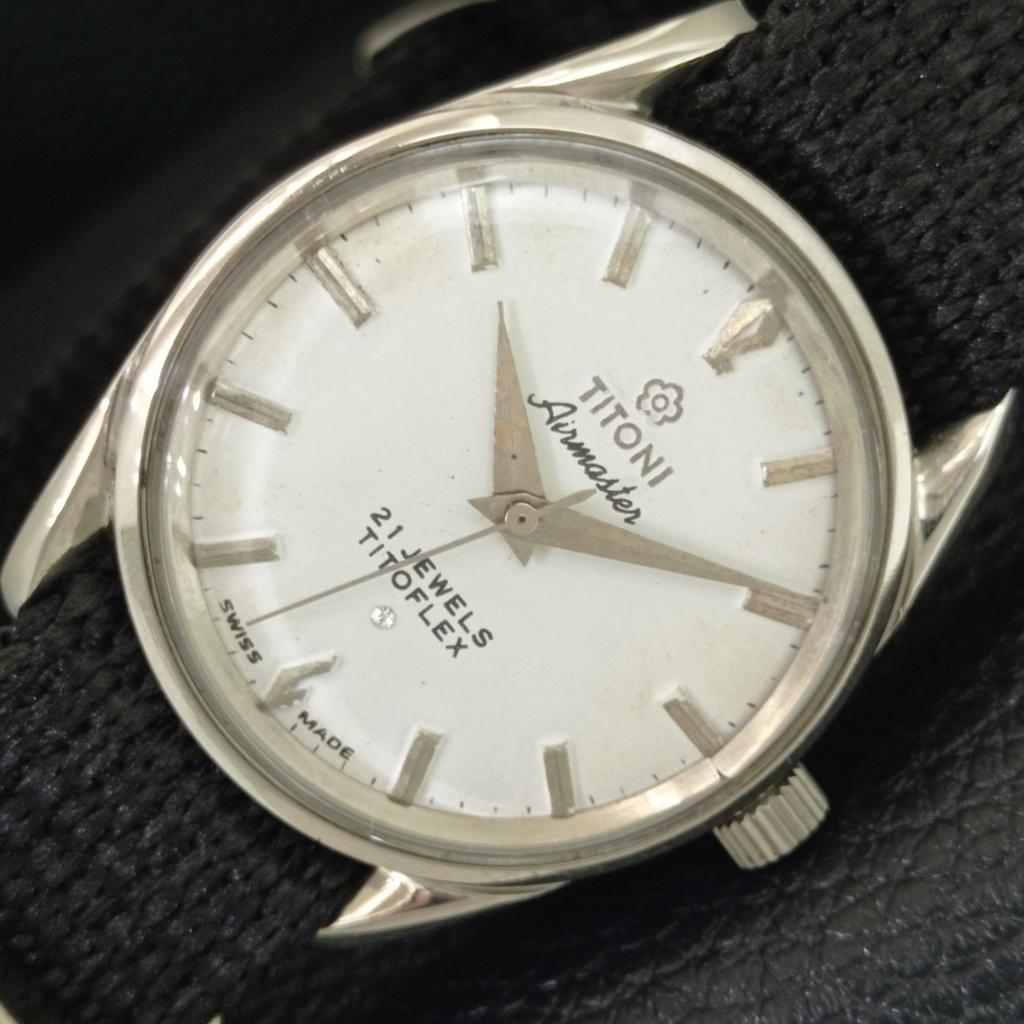 SWISS VINTAGE TITONI AIRMASTER TITOFLEX HAND-WINDING MENS WHITE WATCH a705123-1
SWISS VINTAGE TITONI AIRMASTER TITOFLEX HAND-WINDING MENS WHITE WATCH a705123-1