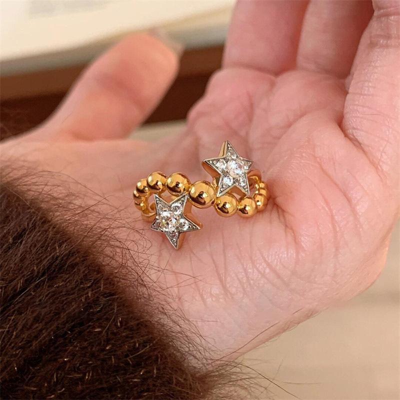 Zircon irregular star opening ring light luxury fashion niche high-end versatile earrings
Zircon irregular star opening ring light luxury fashion niche high-end versatile earrings